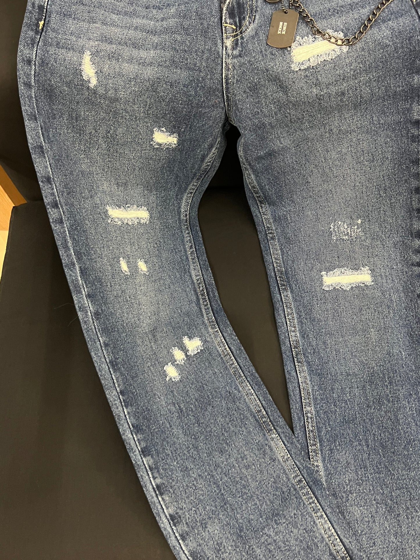 Jeans 5 tasche c/abrasioni c/logo