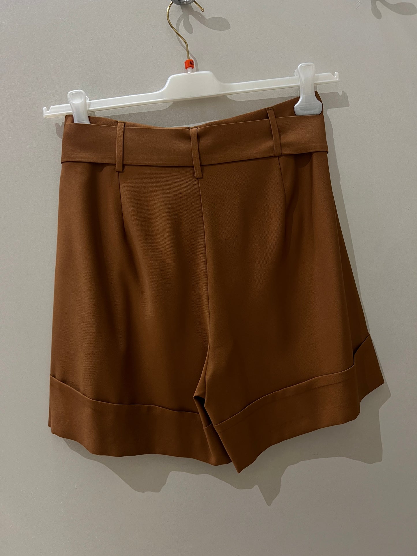 Shorts con fusciacca.