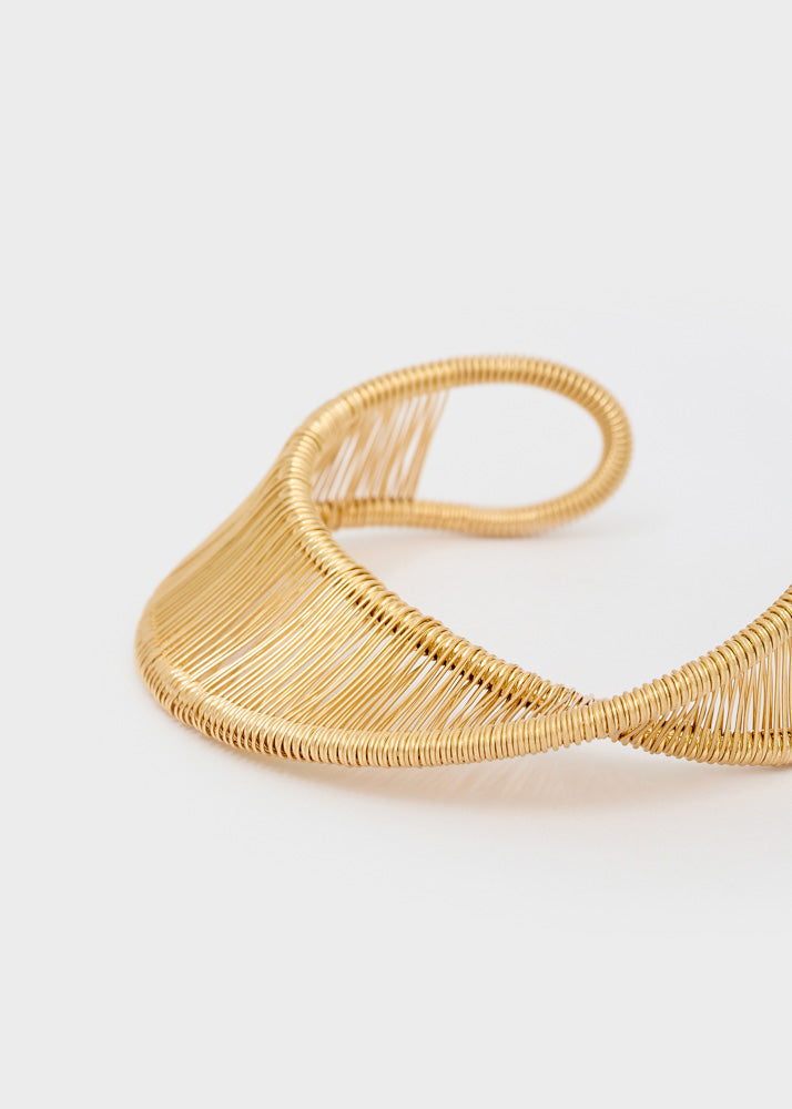 Bracciale sinuoso regolabile oro