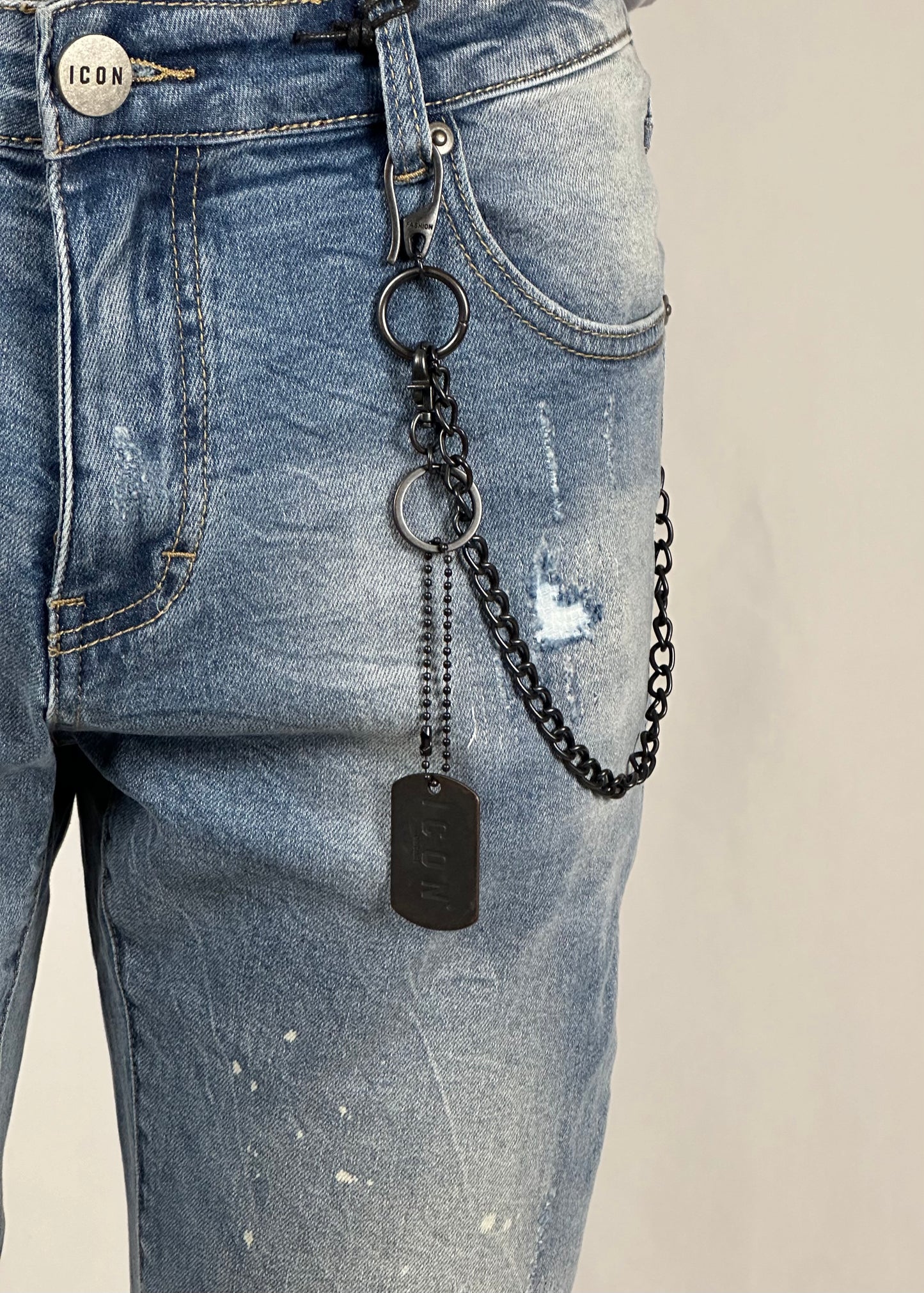 Jeans cinque tasche con logo bianco
