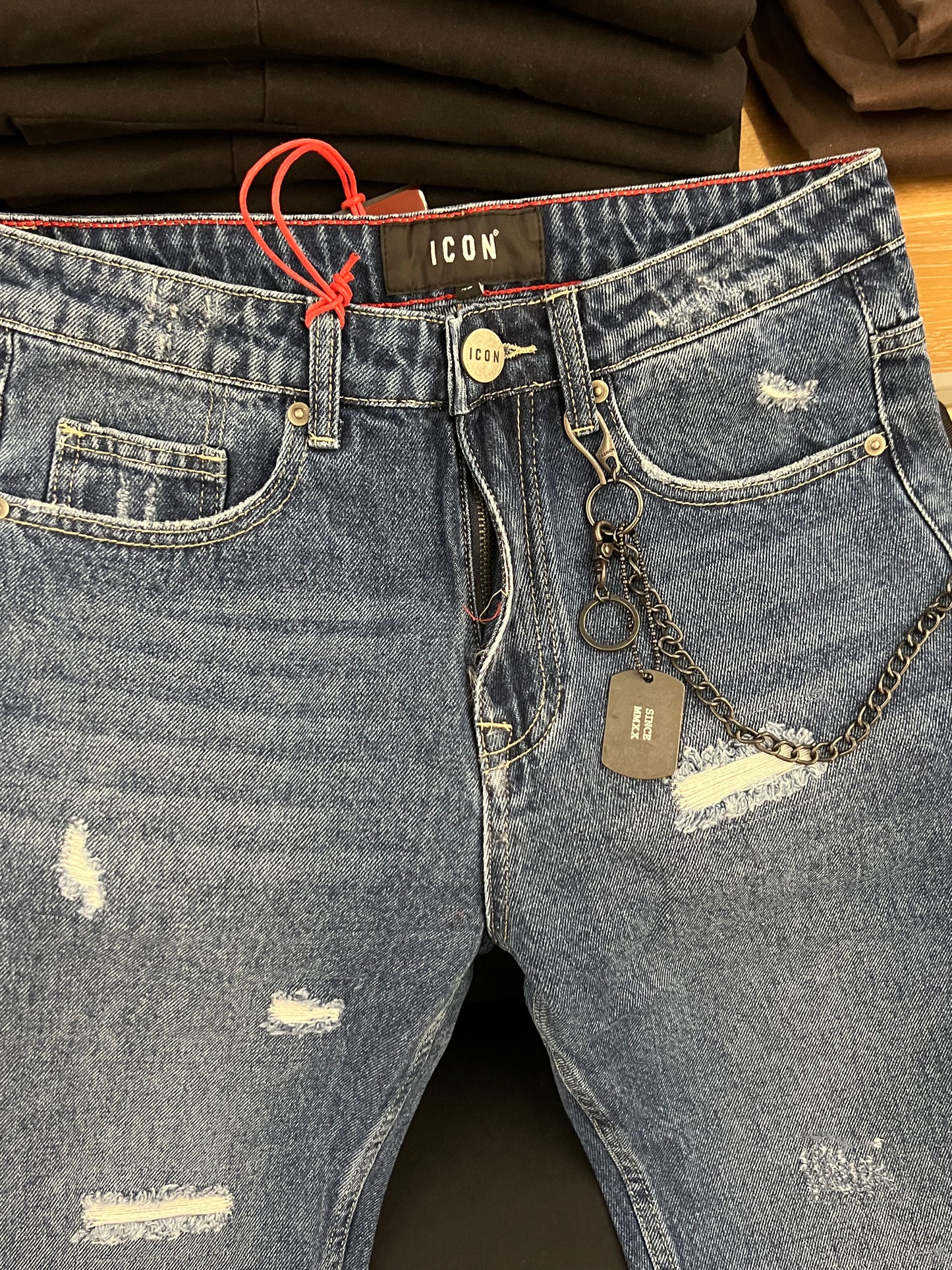 Jeans 5 tasche c/abrasioni c/logo