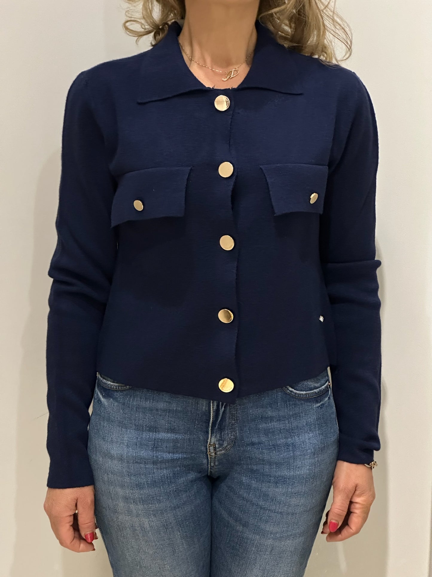 Giacca corta in maglia con tasche