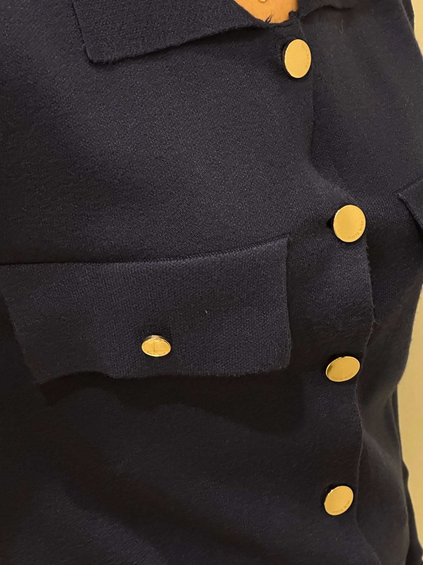 Giacca corta in maglia con tasche
