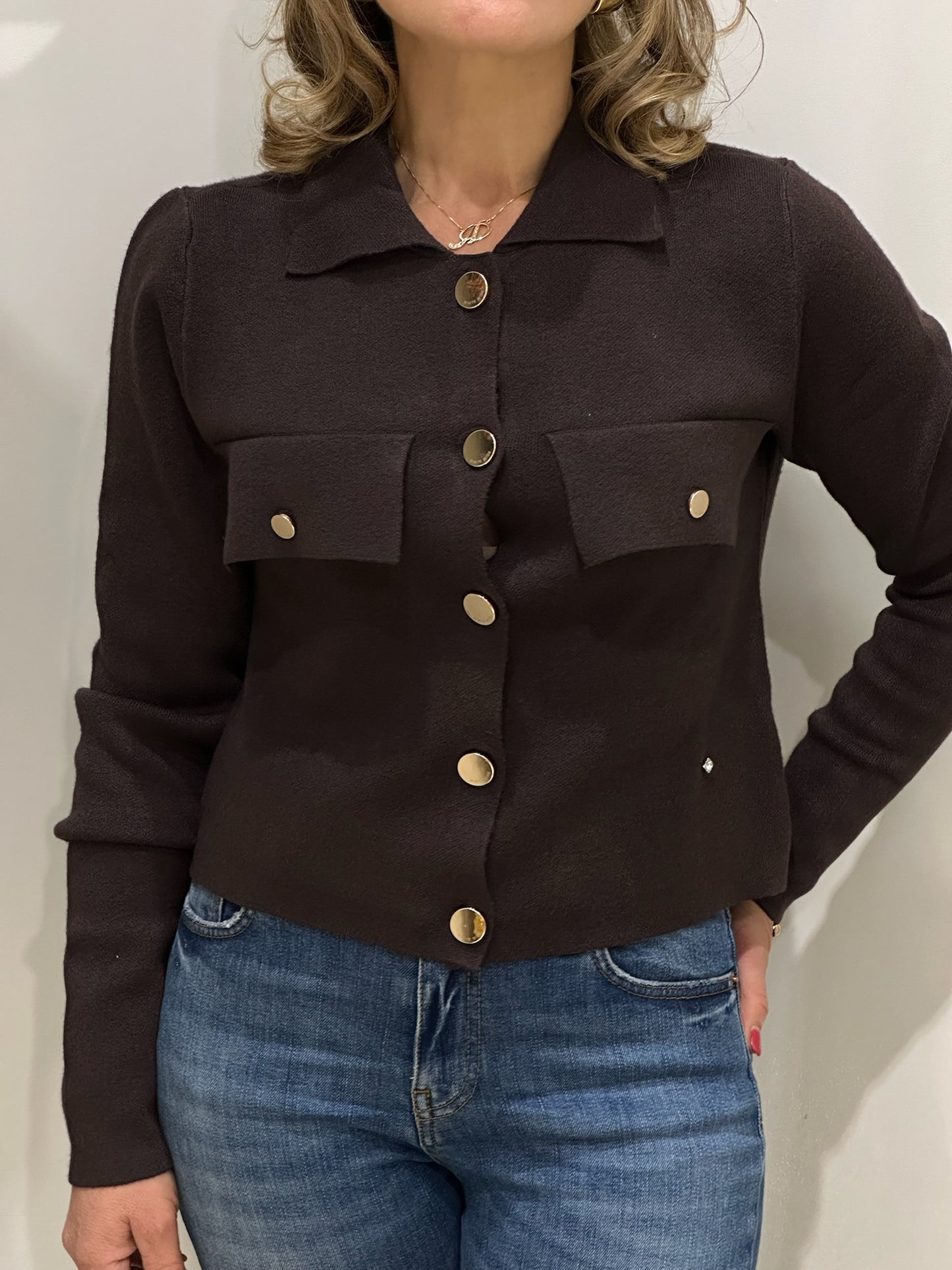 Giacca corta in maglia con tasche