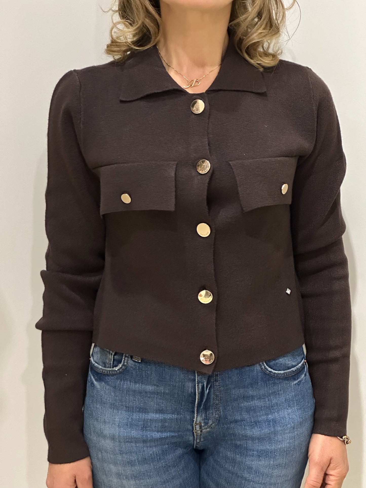 Giacca corta in maglia con tasche