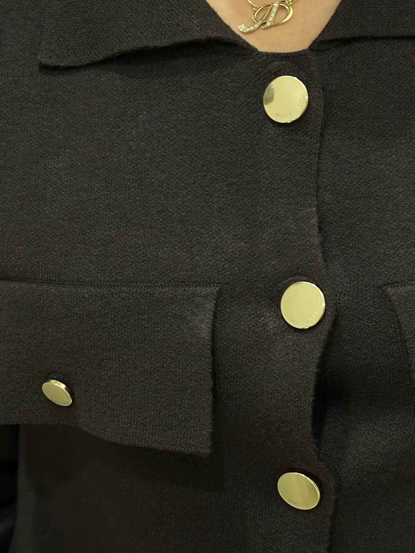 Giacca corta in maglia con tasche