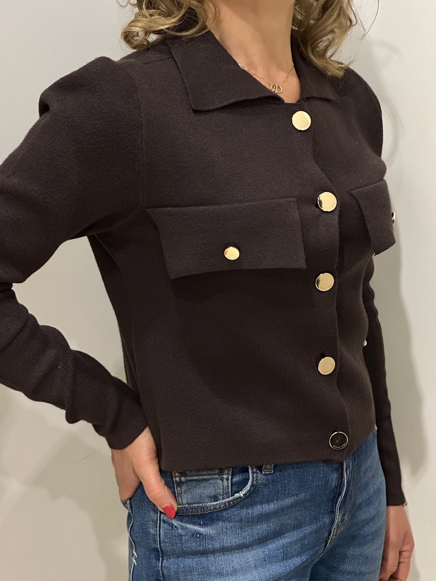 Giacca corta in maglia con tasche