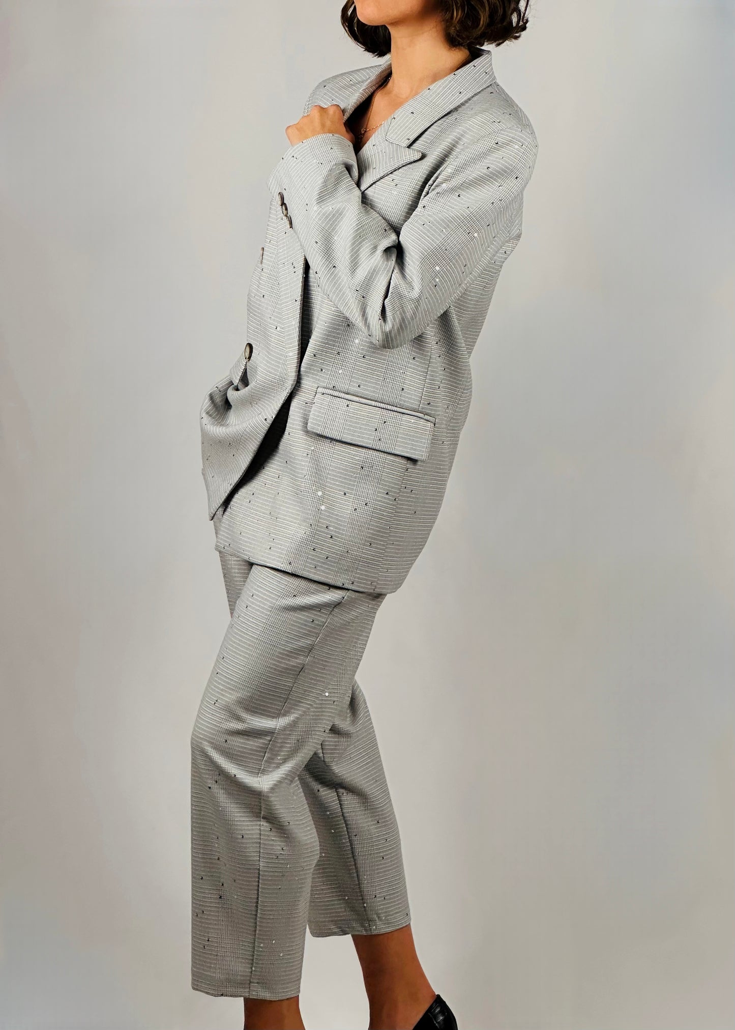 Pantalone grigio con punti luce