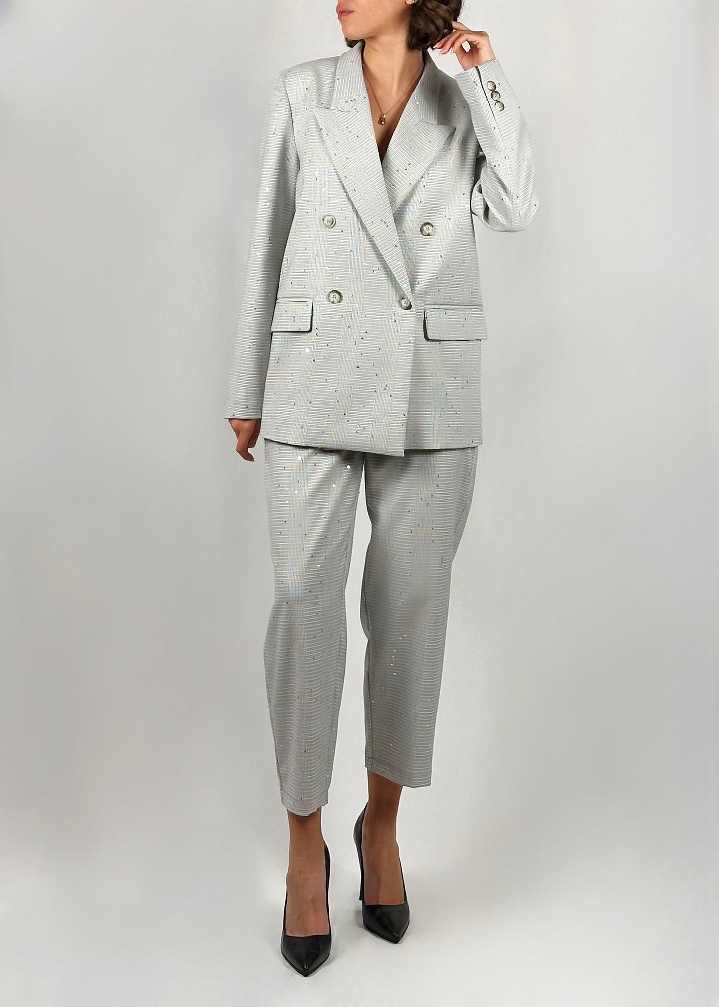 Pantalone grigio con punti luce
