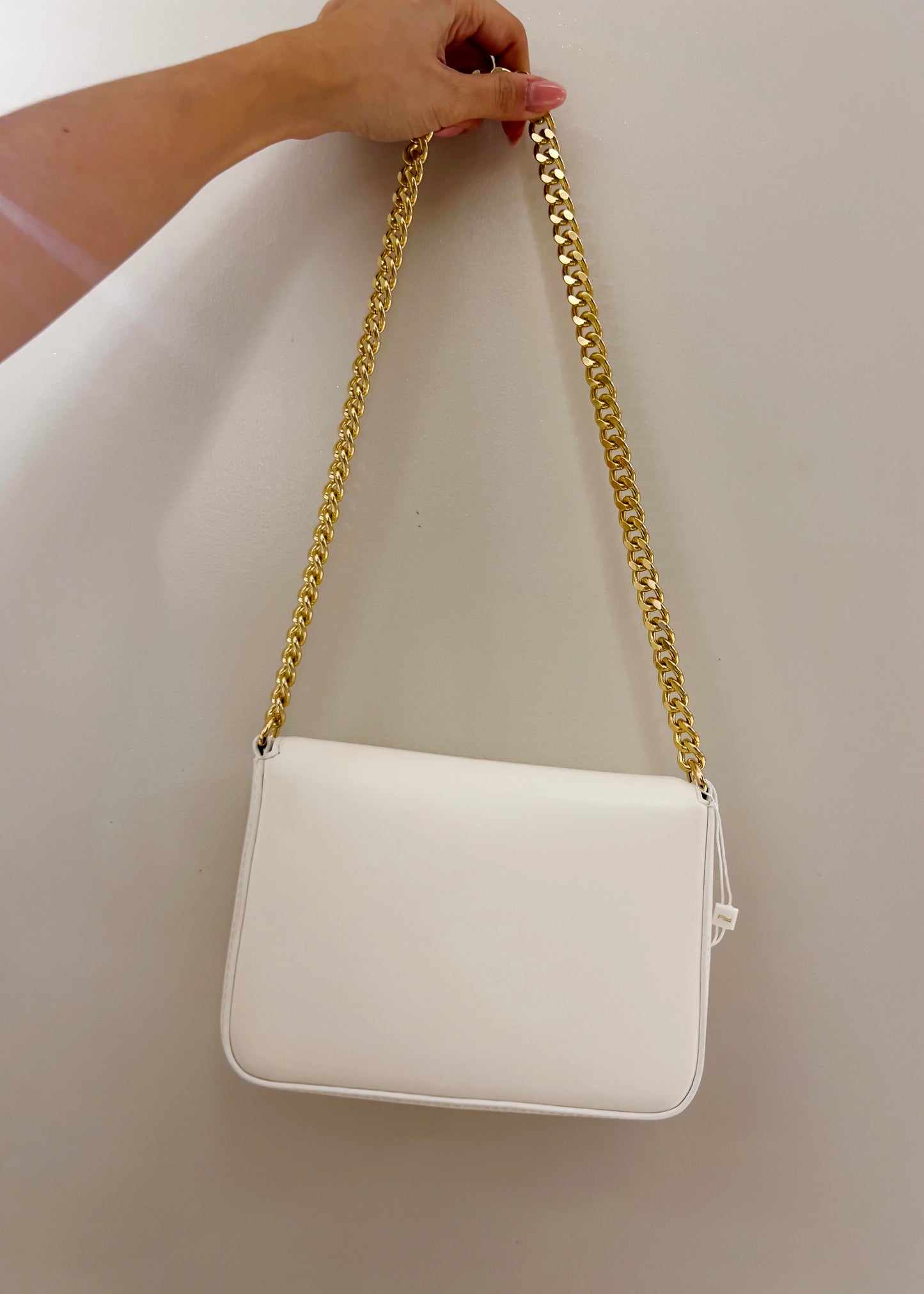 Pochette Artigli con catena corallo