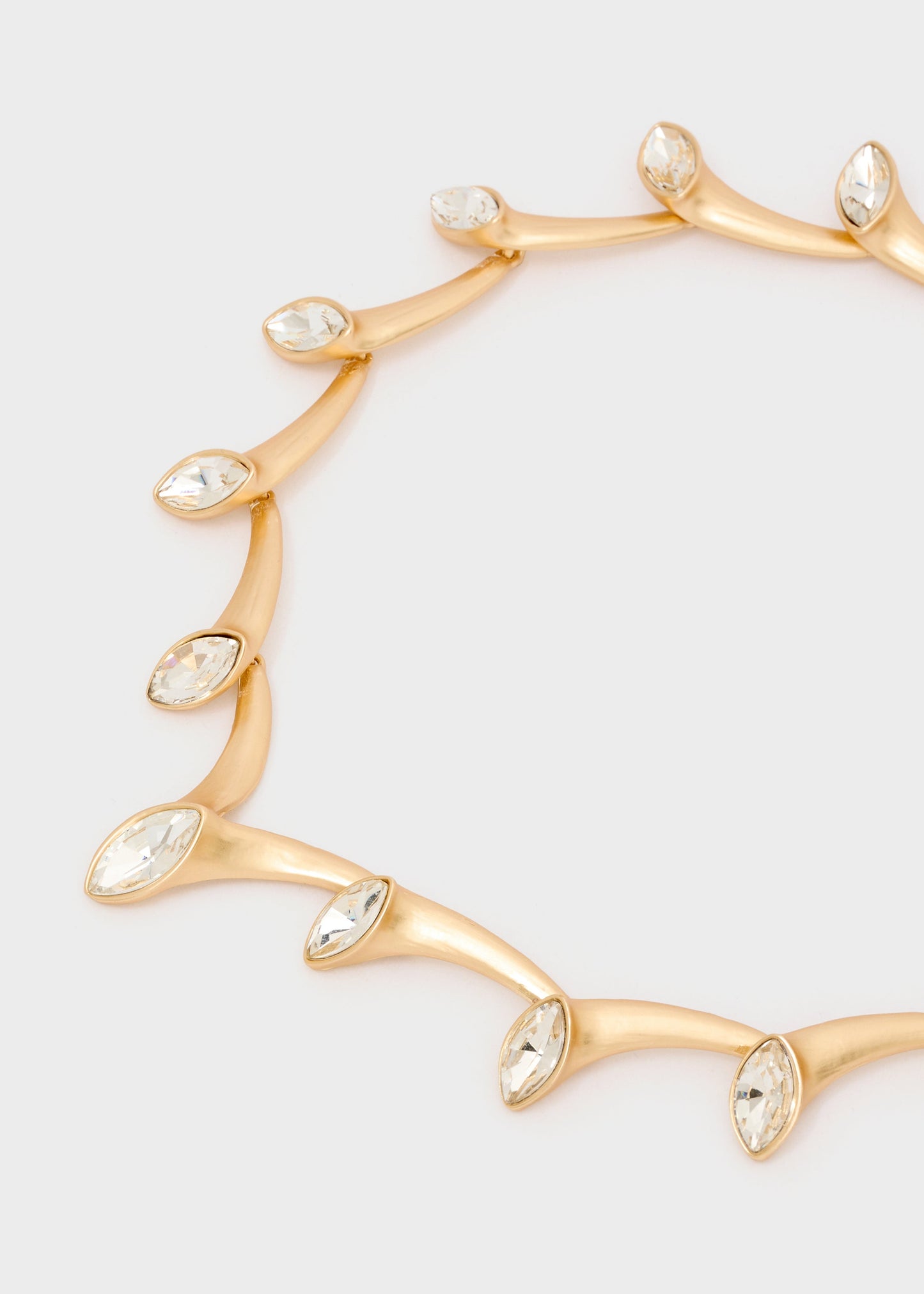 Collana girocollo con elementi e pietre oro