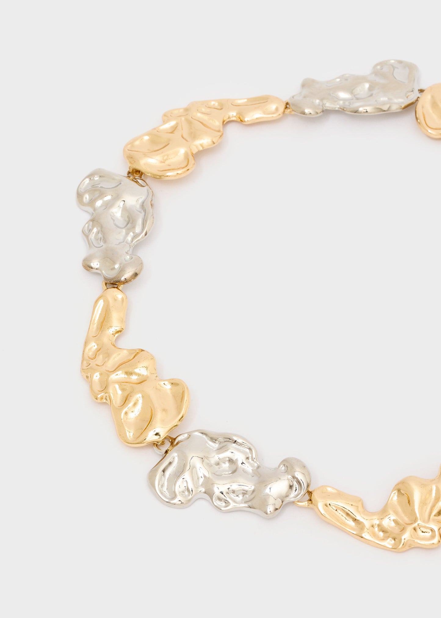 Collana girocollo martellata argento e oro