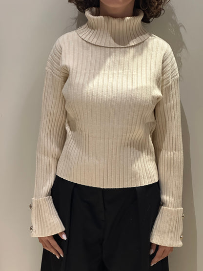 Maglia collo alto senape o beige