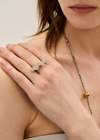 Anello wave con pietre