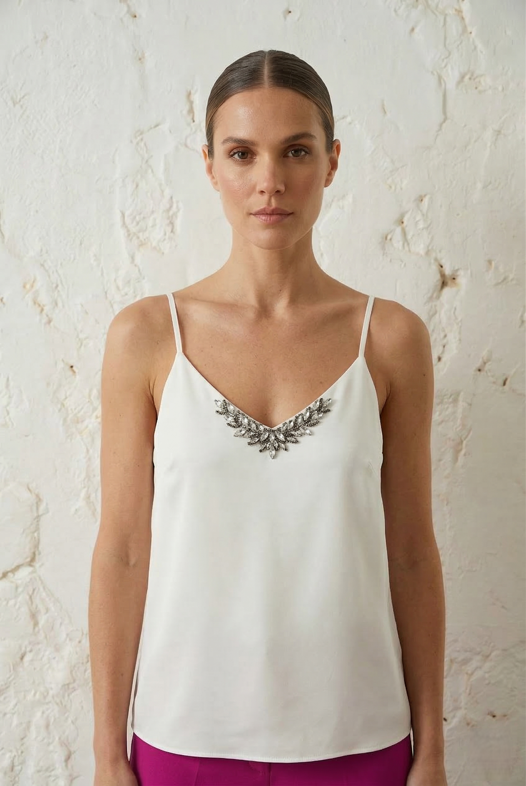 Top bretelle con scollo