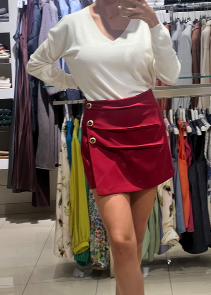 Shorts con pannello bottoni