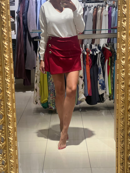 Shorts con pannello bottoni