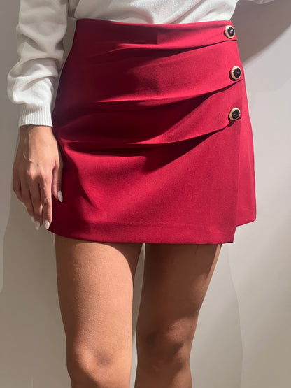Shorts con pannello bottoni