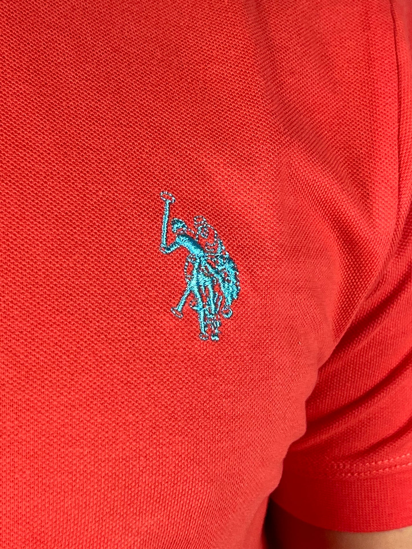 T-shirt bren arancione con logo azzurro nido d'ape