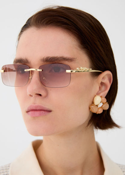 Orecchini a lobo in resina beige