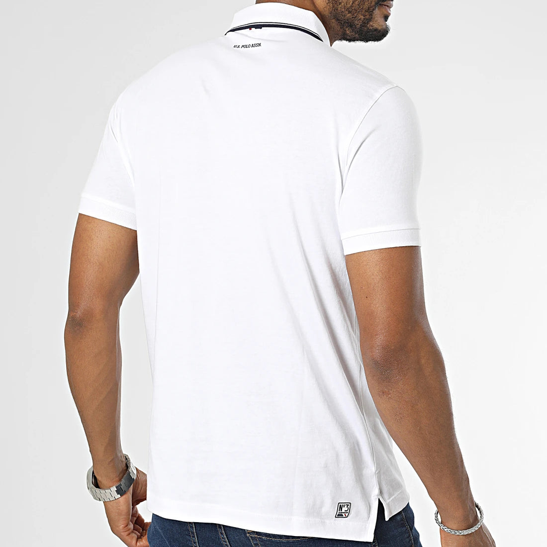 US POLO ASSN. SHORT SLEEVED POLO SHIRT IN WHITE BARR JERSEY SS23